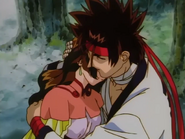 Sanosuke crying while holding Magdalia