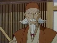 Okina sweeping the floor at the front of the Aoiya