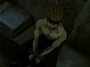 An imprisoned Chō waiting in the jail cell