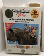 Ryan Dorin, Sh'Vaughn Heath, Alanna Mulhern, Heather Green, and Steven Brooks riding an elephant on the original VHS cover.