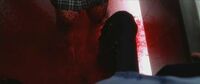 Gogo disembowels a Tokyo Businessman.