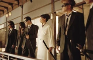 O-Ren Ishii surrounded by yakuza.