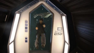 Wilson going out an airlock