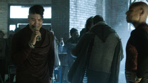 A musician (Wolf Saga) singing in The Royale.