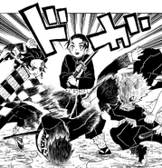 Tanjiro and Inosuke protecting Murata