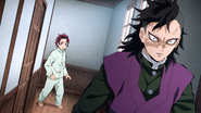 Tanjiro encountering Genya, who has grown taller.