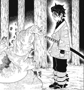 In his final moments, the Hand Demon reaches out for Tanjiro.