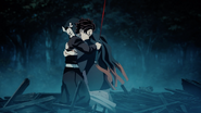 Tanjiro embraces Nezuko after freeing her.