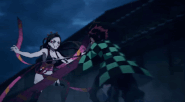 Tanjiro uses his Fake Rainbow technique to evade Daki's attack.