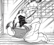 Inosuke defeating the Horned Demon.