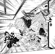 Tanjiro getting attacked by Demons.