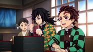 Giyu eats as Tanjiro demands more soba.