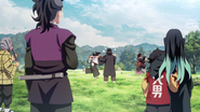 Nezuko being chased by Hotaru.