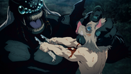 Inosuke stabbing the Father Spider Demon