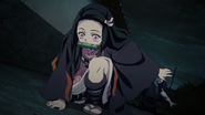 Nezuko returning to Tanjiro's call.