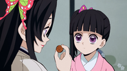 Kanae giving a coin to Kanao to make decisions.