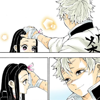 Sanemi comforting Nezuko