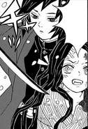 Giyu threatens Nezuko.