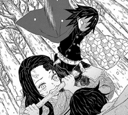 Giyu attacks Nezuko.