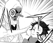 Sakonji slapping Tanjiro.