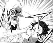 Sakonji slaps Tanjiro.