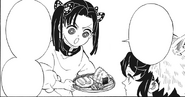Aoi giving food to Inosuke.