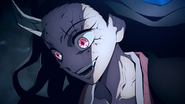 Nezuko smiling menacingly at Daki.