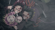 Genya pushes Mitsuri from Zohakuten.