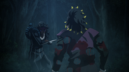 Aizetsu poised to attack Genya after he saves Tanjiro.