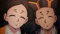 Doma's parents, the co-founders of the cult.