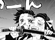 Tanjiro singing Nezuko to sleep.