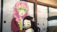 Mitsuri playing with Nezuko.