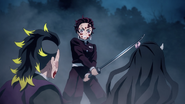 Genya follows Tanjiro's directions.