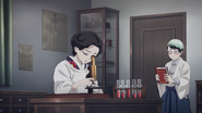 Yushiro admiring Tamayo as she does research.