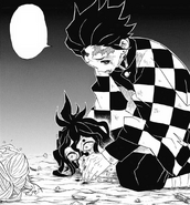 Tanjiro intervenes in the siblings' argument.