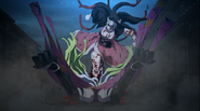 Nezuko pierces Daki's back with her leg.