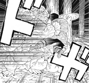 Taking advantage of Tanjiro's rage-filled charge, the Hand Demon lands a heavy blow on the would-be Demon Hunter.