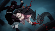 Nezuko saves Tanjiro but loses an arm and leg.