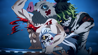 Gyutaro stabbing Inosuke's chest
