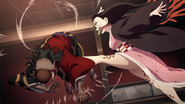 Nezuko kicks Hantengu.