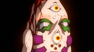 Gyokko enraptured by Muzan's hand on his head.