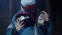 Sakonji embraces Tanjiro and Nezuko