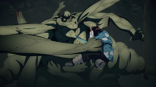 Демон рук бьет Танджиро.