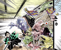 Tanjiro gets attacked by a group of demons