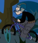 RonClothesAttackoftheKillerBebes-MissionOutfitBicycle.jpg (353 KB) In Mission Outfit with safety helmet, goggles and microphone as he stubbornly cycles up to the mission location, separate from Kim.
