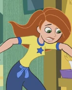 Yellow shirt with blue star, blue pants