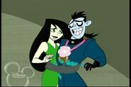 Drakken and Shego having an awkward moment. Wrapped up together.