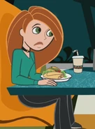 Aqua green sweater, black choker, grey pants