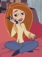 Pale yellow blouse, blue pants