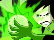 Shego forms an energy sphere